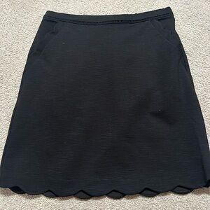 Black scalloped skirt